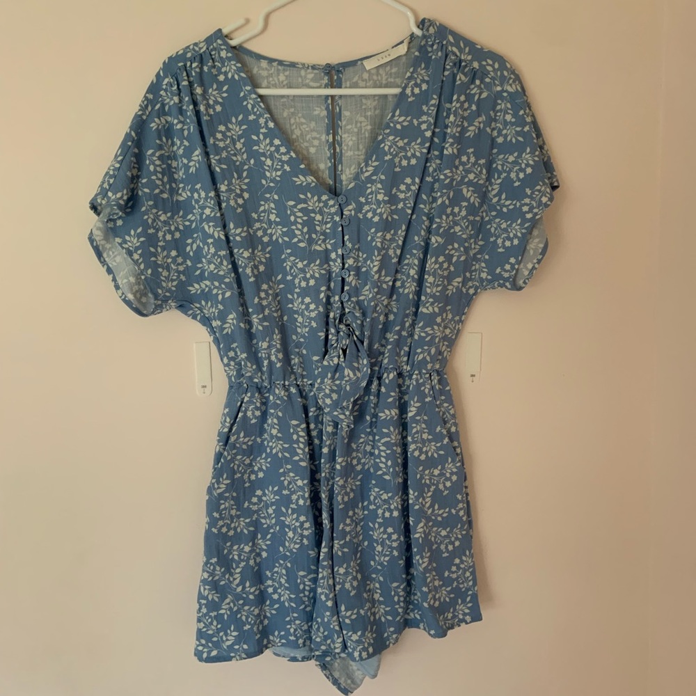Lush Clothing Brand Tie-Front Summer Romper in Light Blue with White Flowers